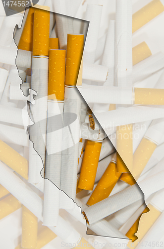 Image of Outline map of California with transparent cigarettes in backgro