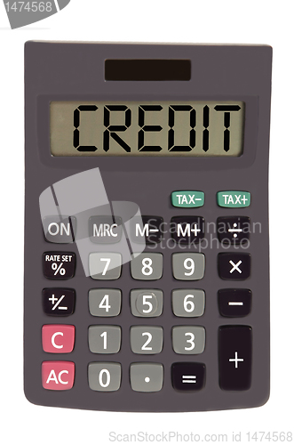 Image of Old calculator on white background showing text "credit"