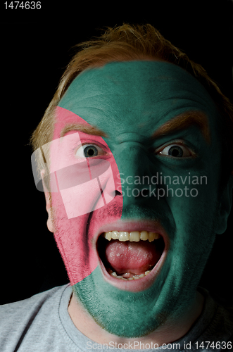 Image of Face of crazy angry man painted in colors of Bangladesh flag