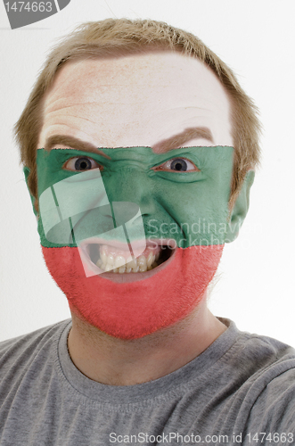 Image of Face of crazy angry man painted in colors of bulgaria flag