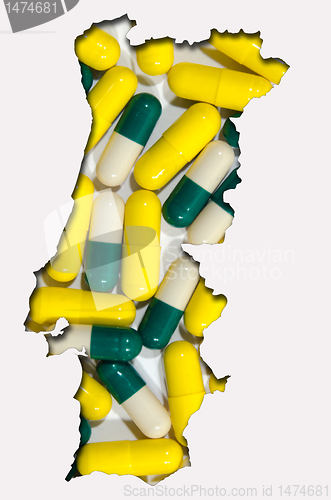 Image of Outline map of Portugal with pills in background