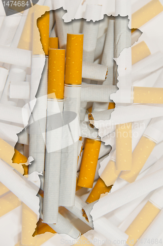 Image of Outline map of Portugal with transparent cigarettes in backgroun
