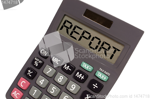 Image of Old calculator on white background showing text "report" in pers