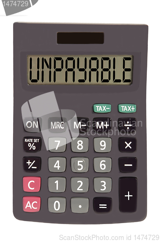 Image of Old calculator on white background showing text "unpayable"