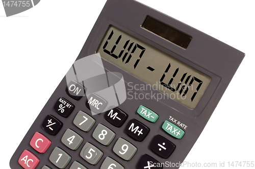 Image of Old calculator on white background showing text "win win" in per