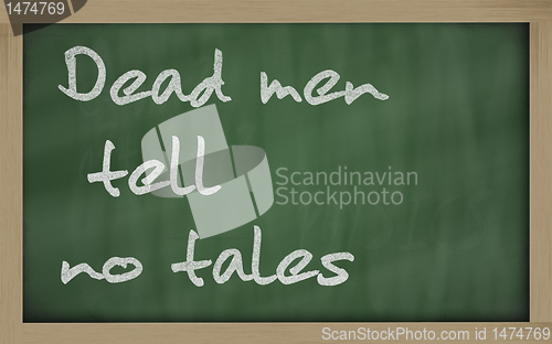 Image of " Dead men tell no tales " written on a blackboard