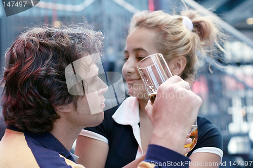 Image of Romantic couple drinking beer