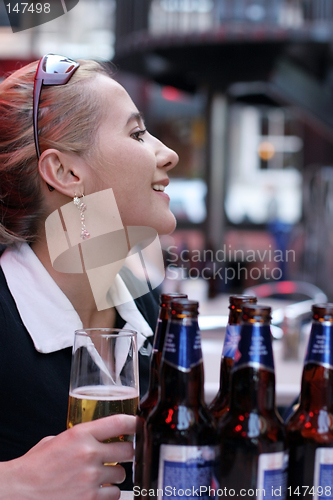 Image of Girl with beer bottles