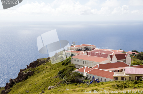 Image of  village typical architecture on cliff over Caribbean Sea on "Th