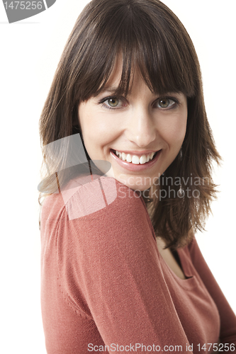 Image of Beautiful woman smiling at the camera, isolated on white