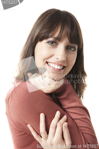 Image of Beautiful woman smiling at the camera, isolated on white