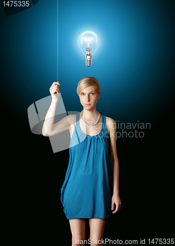 Image of blonde in blue turn on the light