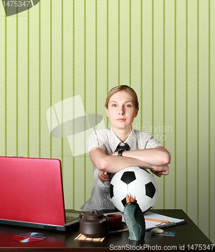 Image of businesswoman watching soccer competitions