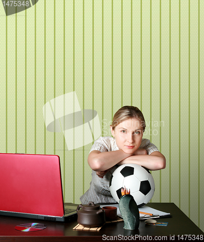 Image of businesswoman watching soccer competitions