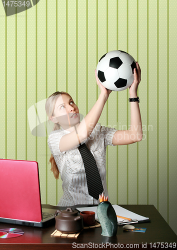 Image of businesswoman watching soccer competitions