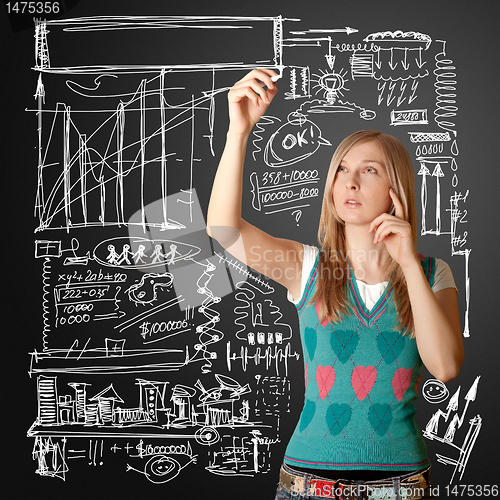 Image of businesswoman writing something