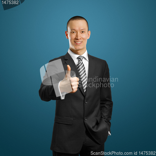 Image of asian businessman in black suit shows well done