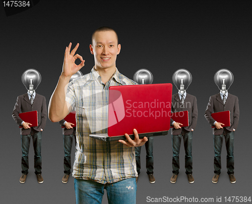 Image of lamp head businesspeople with laptop