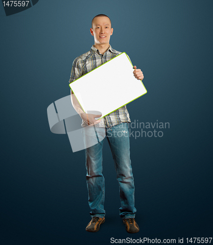 Image of asian male with write board in his hands