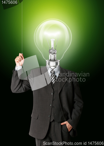 Image of business man turn on hith bulb head