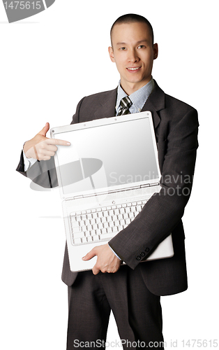 Image of businessman with open laptop shows something