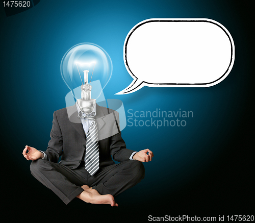 Image of businessman in lotus pose and lamp-head with thought bubble