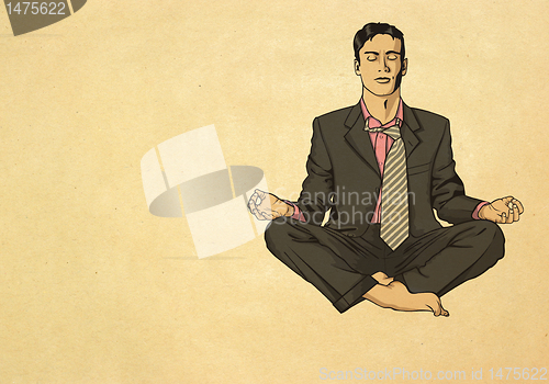 Image of businessman in lotus pose meditating