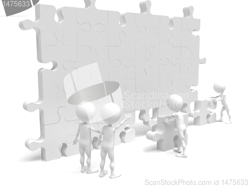 Image of business team work building a puzzle