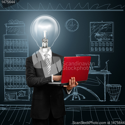 Image of lamp head businessman with laptop