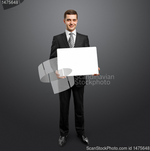 Image of businessman with empty write board