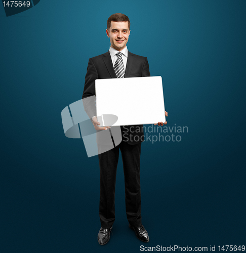 Image of businessman with empty write board