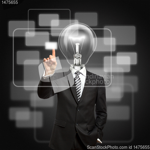 Image of businessman with lamp-head push the button