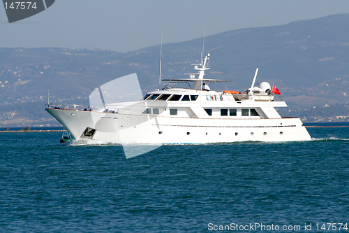 Image of Motor boat leaving the marina