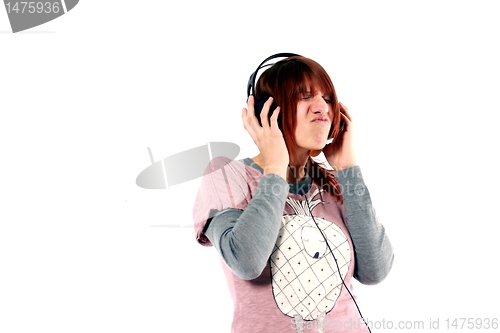Image of girl hearing music