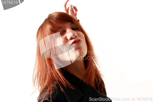 Image of red haired girl dancing