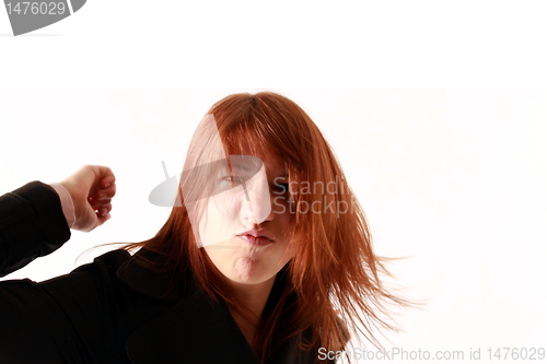 Image of red haired girl dancing