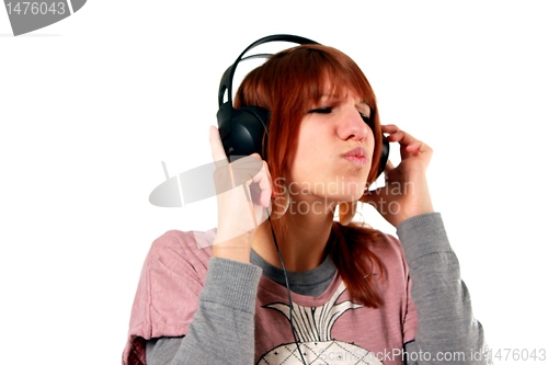 Image of girl hearing music