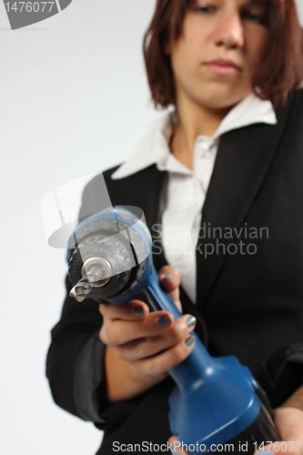 Image of girl with drill