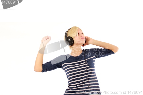 Image of girl hearing music