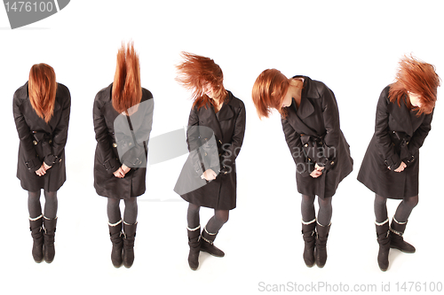Image of red haired girl dancing