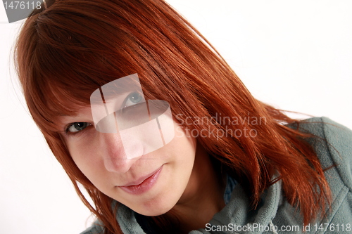 Image of red haired girl smiling