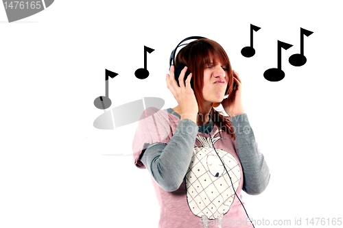 Image of girl hearing music