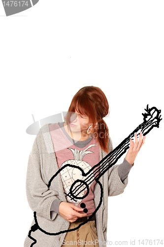 Image of air guitar girl