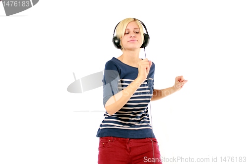 Image of girl hearing music