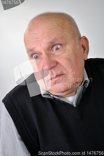 Image of senior man with puzzled expression