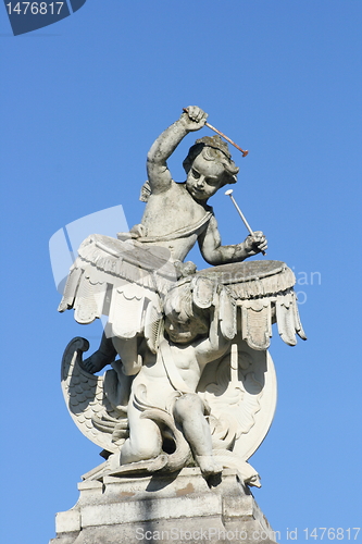 Image of white stone carved boy