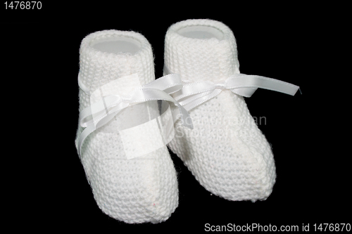 Image of baby socks with black background ties