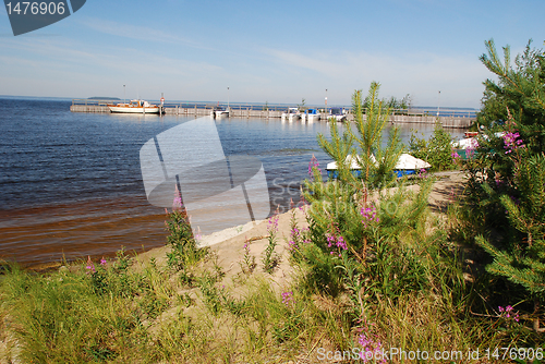 Image of Sandy beach and boat station in Manamansalo island, Finland