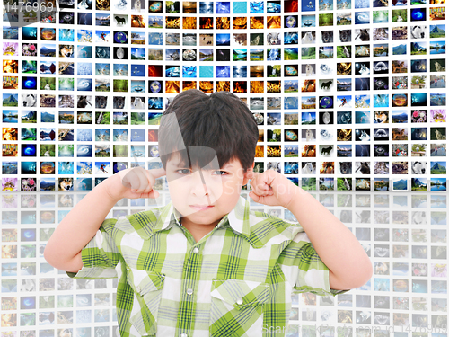 Image of kid protecting ears from loud noise of so many screens talking