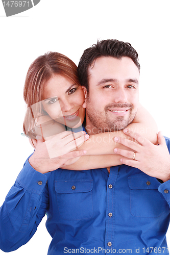 Image of woman holding with love her boyfriend from behind, posing at cam